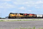 UP 8825 South on KCS grain train